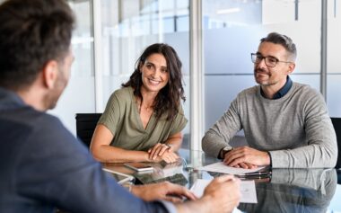 Mature Couple Meeting Financial Advisor For Investment