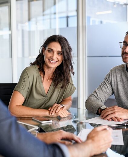 Mature Couple Meeting Financial Advisor For Investment