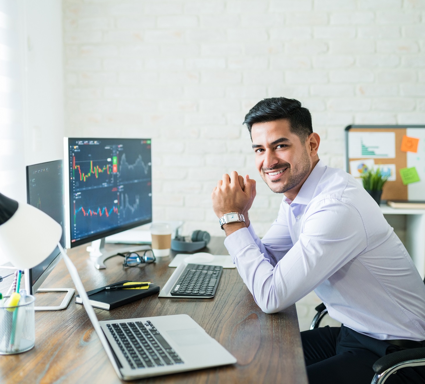 Happy Attractive Young Stock Broker Working At Home